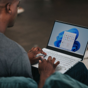 person-working-on-windows-11-computer-on-the-couch-stockpack-unsplash.jpg person working on Windows 11 computer on the couch