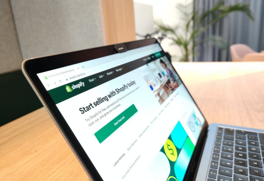 shopify-ecommerce-platform-visible-in-the-macbook-air-on-the-wooden-table-e-commerce-tips-wwwhooklenetpost10-e-commerce-tips-for-small-businesses-stockpack-unsplash.jpg Shopify ecommerce platform visible in the MacBook Air on the wooden table.E-commerce tips: www.hookle.net/post/10-e-commerce-tips-for-small-businesses
