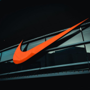 a-large-orange-nike-logo-on-the-side-of-a-building-stockpack-unsplash.jpg a large orange nike logo on the side of a building