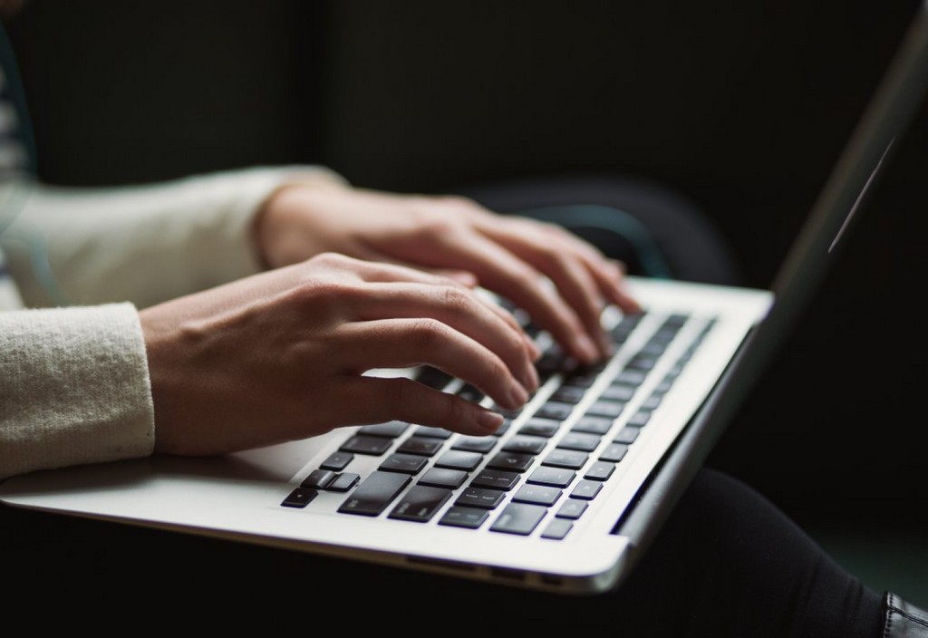 person-using-laptop-stockpack-unsplash.jpg person using laptop
