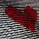 Red heart made out of binary digits