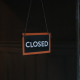closed-sign-hanging-on-a-window-stockpack-unsplash.jpg Closed sign hanging on a window