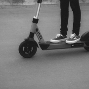 person-riding-black-and-white-kick-scooter-stockpack-unsplash.jpg person riding black and white kick scooter
