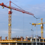 three-yellow-and-red-tower-cranes-under-clear-blue-sky-stockpack-pexels.jpg Three yellow and red tower cranes under clear blue sky