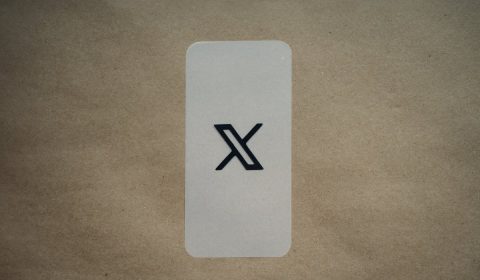 a white card with a black x on it