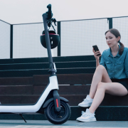 a-woman-sitting-on-steps-next-to-a-scooter-stockpack-unsplash.jpg a woman sitting on steps next to a scooter