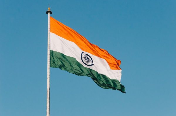 The Indian tricolour flag waving in the wind at the Wagah border near Amritsar in Punjab, India. Buy me a coffee if you like this photo: https://www.buymeacoffee.com/naveedahmed