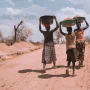 three-women-carrying-basin-while-walking-barefoot-stockpack-unsplash.jpg three women carrying basin while walking barefoot