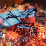 christmas-gifts-with-garland-lights-and-decoration-balls-stockpack-unsplash.jpg Christmas gifts with garland lights and decoration balls