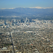 Downtown Los Angeles and surrounding areas with mountains in the background.