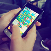 person-playing-candy-crush-on-nokia-smartphone-stockpack-pexels.jpg Person playing candy crush on nokia smartphone