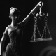 a-grayscale-of-a-lady-justice-figurine-stockpack-pexels.jpg A grayscale of a lady justice figurine