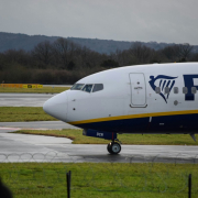 a large passenger jet sitting on top of an airport runway