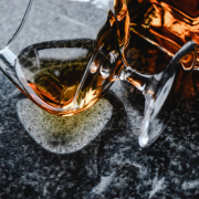 close-up-shot-of-a-bottle-of-alcoholic-beverage-stockpack-pexels.jpg Close up shot of a bottle of alcoholic beverage