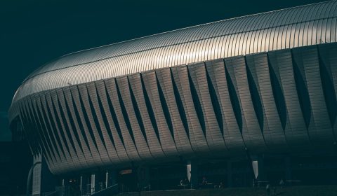 The New Cluj Arena Stadium in Cluj, Romania, seen at sunset in the shadows.