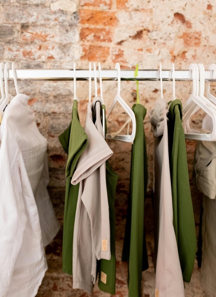 white-tank-top-on-green-textile-stockpack-pexels.jpg White tank top on green textile