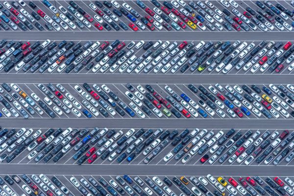 Parking lot of a car dealership from birds eye view