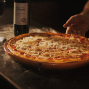 person-holding-pepperoni-pizza-on-tray-stockpack-pexels.jpg Person holding pepperoni pizza on tray