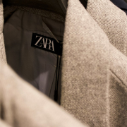 a-close-up-of-a-jacket-with-a-name-tag-on-it-stockpack-unsplash.jpg a close up of a jacket with a name tag on it