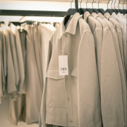 a-rack-of-clothing-with-a-tag-on-it-stockpack-unsplash.jpg a rack of clothing with a tag on it