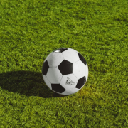 white-and-black-soccer-ball-on-grass-field-stockpack-unsplash.jpg white and black soccer ball on grass field