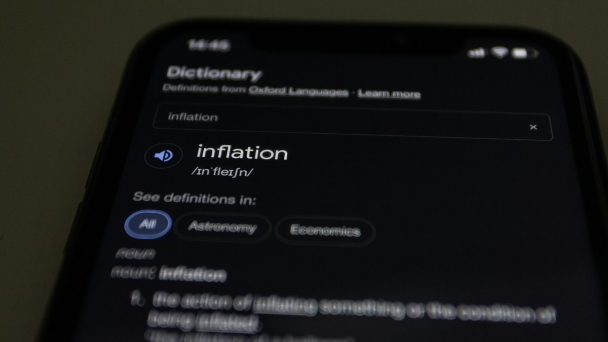 a close up of a cell phone with information on the screen