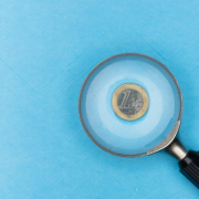 a euro coin under the magnifying glass