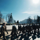 people walking on snow covered ground during daytime