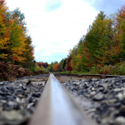black-steel-train-rail-with-pebbles-and-trees-stockpack-pexels.jpg Black steel train rail with pebbles and trees