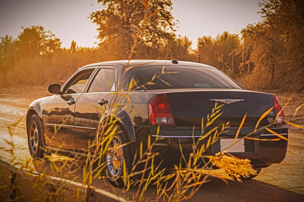 blue-sedan-on-brown-grass-field-during-daytime-stockpack-unsplash.jpg blue sedan on brown grass field during daytime