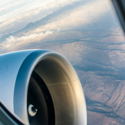 window view of black and white plane propeller