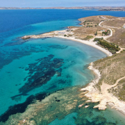 a-view-from-above-shot-at-fanaraki-beach-a-beach-located-at-lemnos-island-in-northeastern-aegean-sea-greece-stockpack-unsplash.jpg A view from above, shot at Fanaraki beach a beach located at Lemnos island in northeastern Aegean sea, Greece.