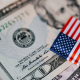 Set of paper banknotes and small flag of usa