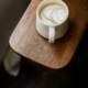 White ceramic mug on brown wooden table
