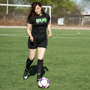 woman-in-black-nike-soccer-jersey-kicking-soccer-ball-on-green-grass-field-during-daytime-stockpack-unsplash.jpg woman in black nike soccer jersey kicking soccer ball on green grass field during daytime