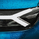 a-close-up-of-a-blue-car-with-rain-drops-on-it-stockpack-unsplash.jpg a close up of a blue car with rain drops on it