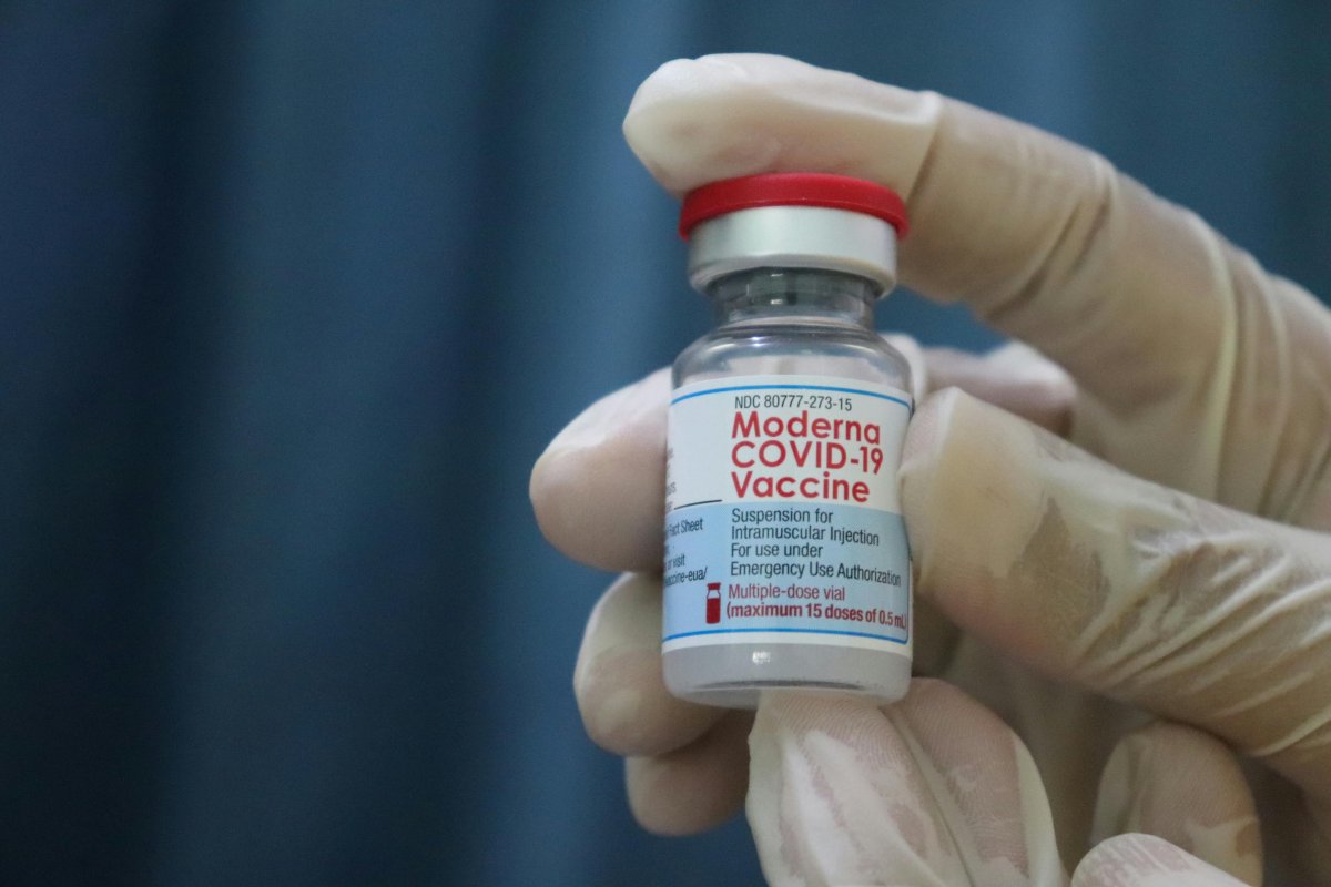 hands-wearing-gloves-while-holding-a-small-bottle-of-vaccine-stockpack-pexels.jpg Hands wearing gloves while holding a small bottle of vaccine