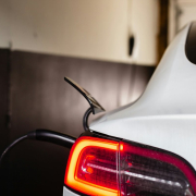 the-tail-light-of-a-white-car-in-a-garage-stockpack-unsplash.jpg the tail light of a white car in a garage