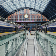 a-train-traveling-through-a-train-station-next-to-a-clock-stockpack-unsplash.jpg a train traveling through a train station next to a clock