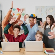 A children clapping together