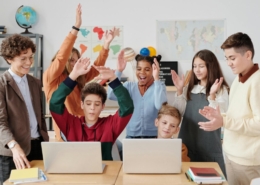 A children clapping together