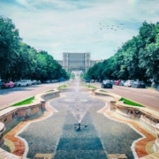 a-fountain-in-the-middle-of-a-street-with-a-building-in-the-background-stockpack-unsplash.jpg a fountain in the middle of a street with a building in the background
