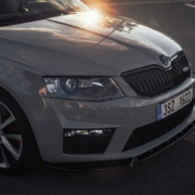 a-silver-car-parked-in-a-parking-lot-stockpack-unsplash.jpg A silver car parked in a parking lot