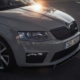 a-silver-car-parked-in-a-parking-lot-stockpack-unsplash.jpg A silver car parked in a parking lot
