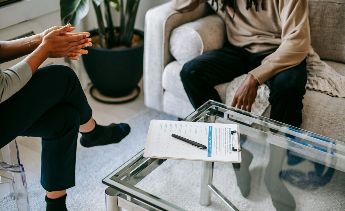 crop-unrecognizable-man-talking-to-female-psychologist-stockpack-pexels.jpg Crop unrecognizable man talking to female psychologist