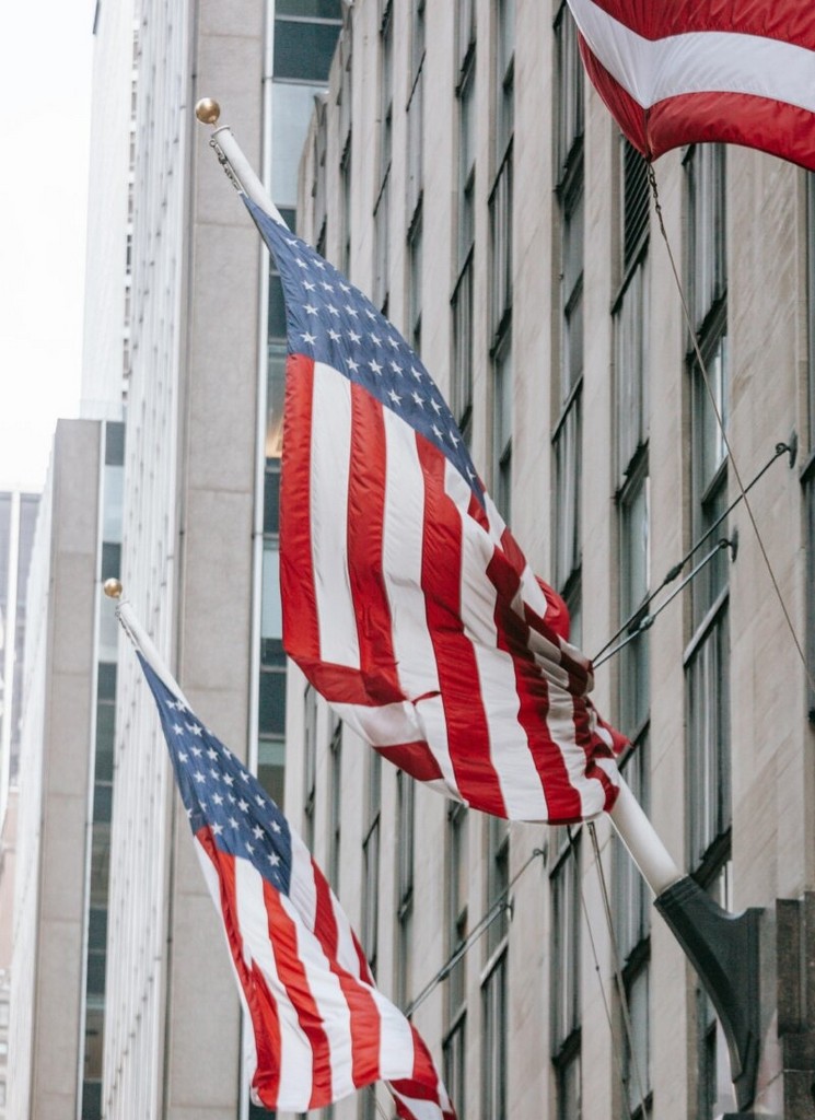 usa-flags-on-wall-of-governmental-building-facade-in-city-stockpack-pexels.jpg Usa flags on wall of governmental building facade in city