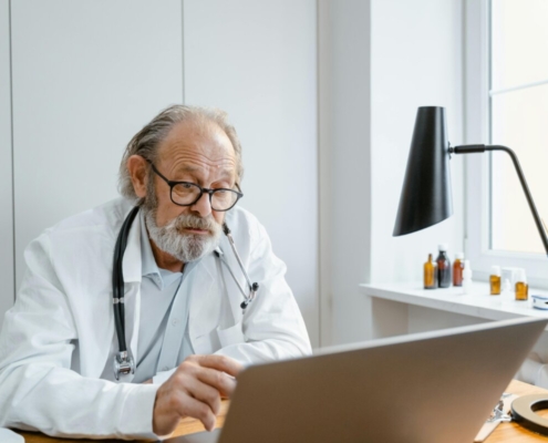 a-doctor-in-a-video-conference-using-a-laptop-stockpack-pexels.jpg A doctor in a video conference using a laptop