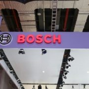 a purple sign that says bosch hanging from the ceiling