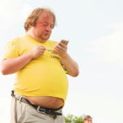 man-in-yellow-shirt-and-brown-pants-using-smartphone-stockpack-unsplash.jpg man in yellow shirt and brown pants using smartphone