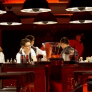 people standing in front of table